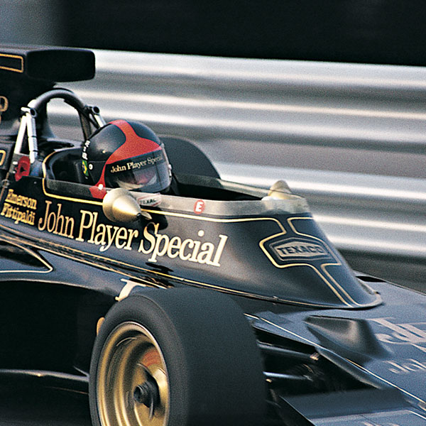 Emerson Fittipaldi in a black Formula 1 car